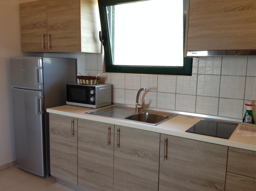 Johannes Boutique Apartments & Suites Afántou Quarto foto